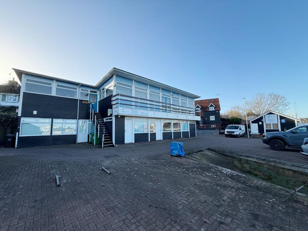 Office, Flat and Store building with parking and s