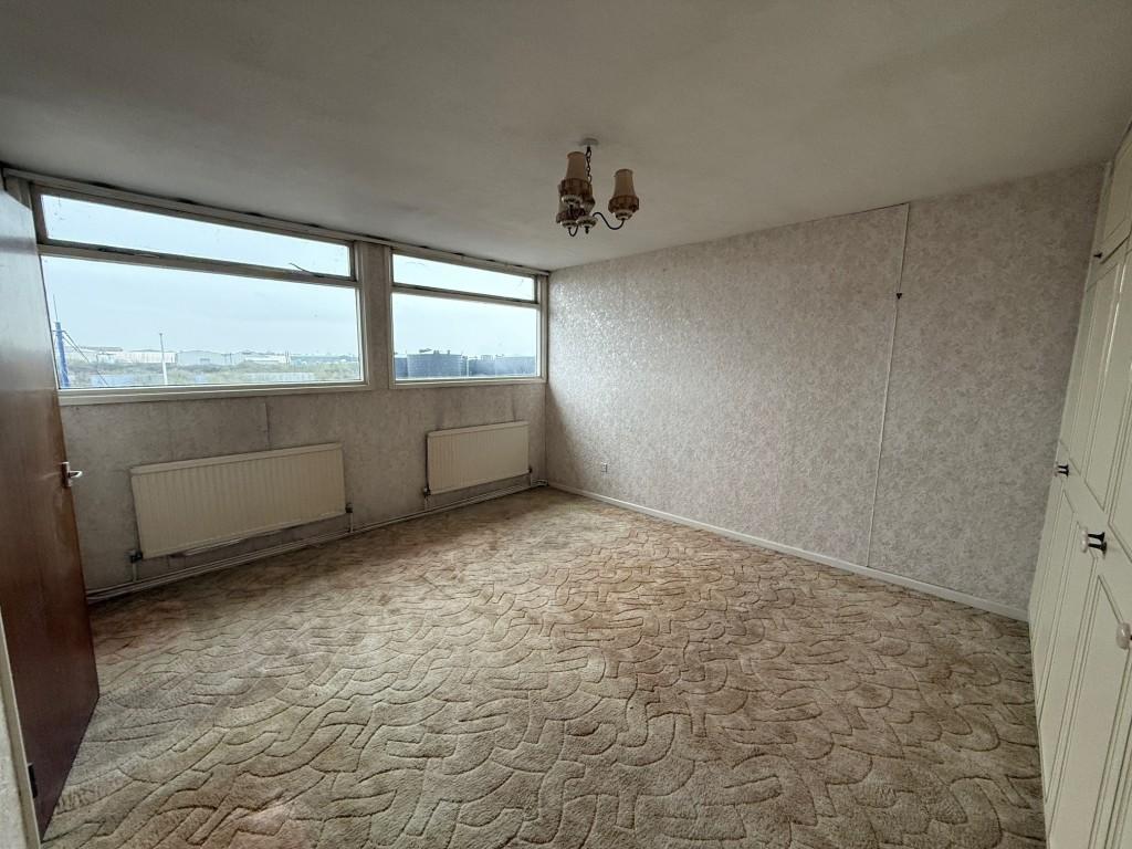 Bedroom two with windows to the front