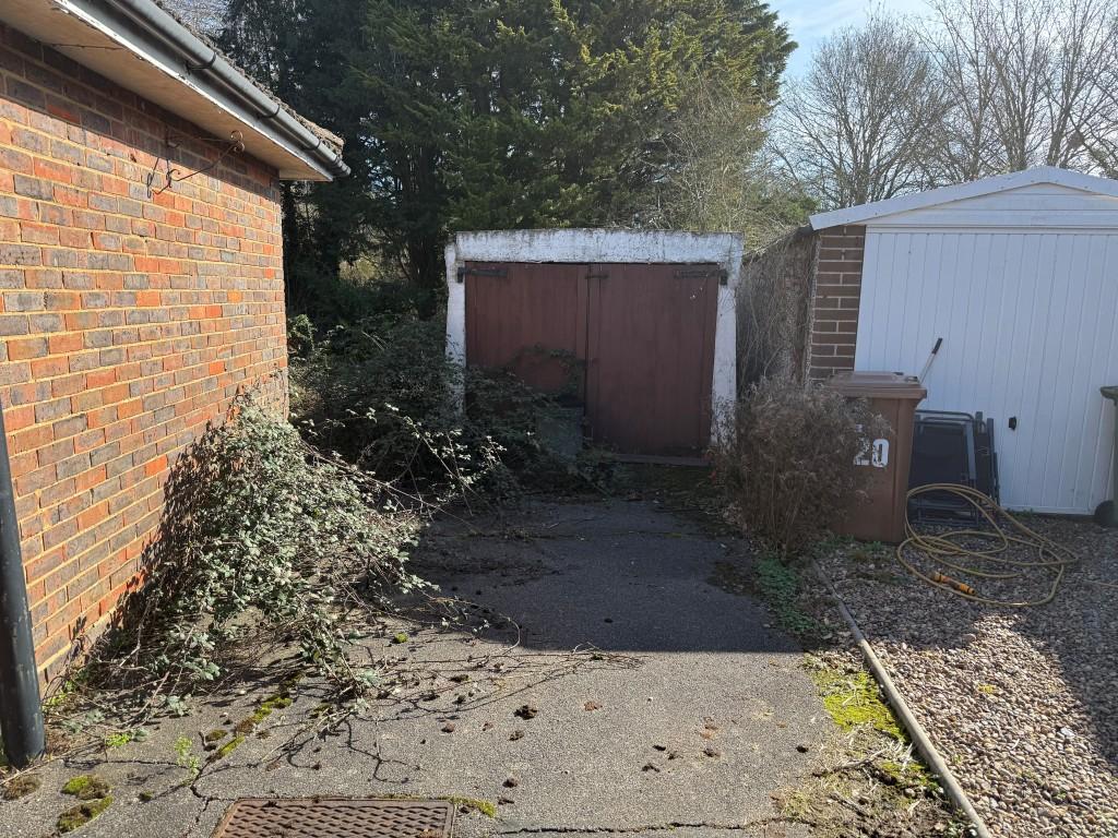 Detached garage and driveway