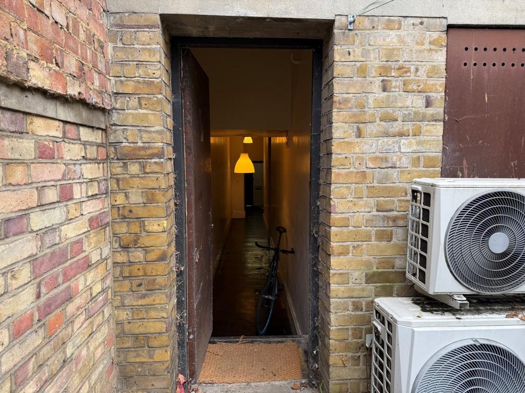 Doorway providing access to rear land