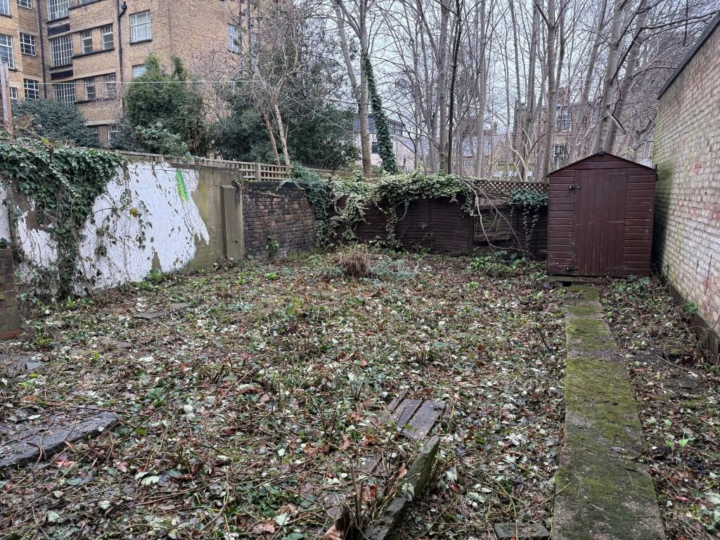 Land showing walled area and shed