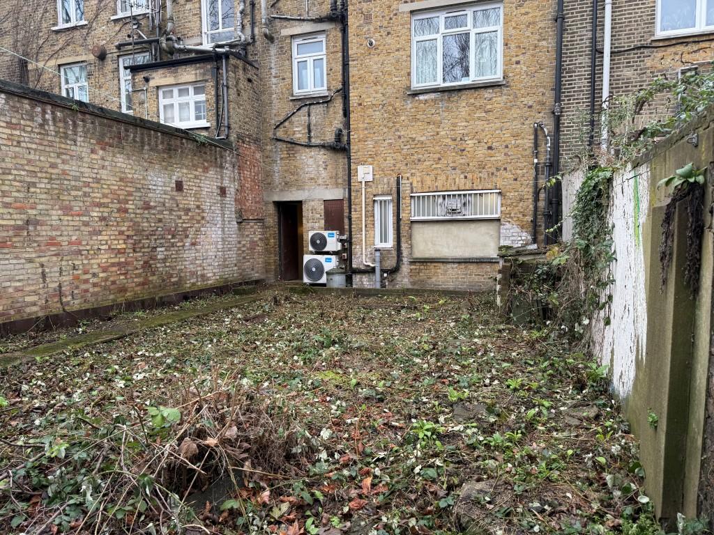 View of land from rear showing brick elevation