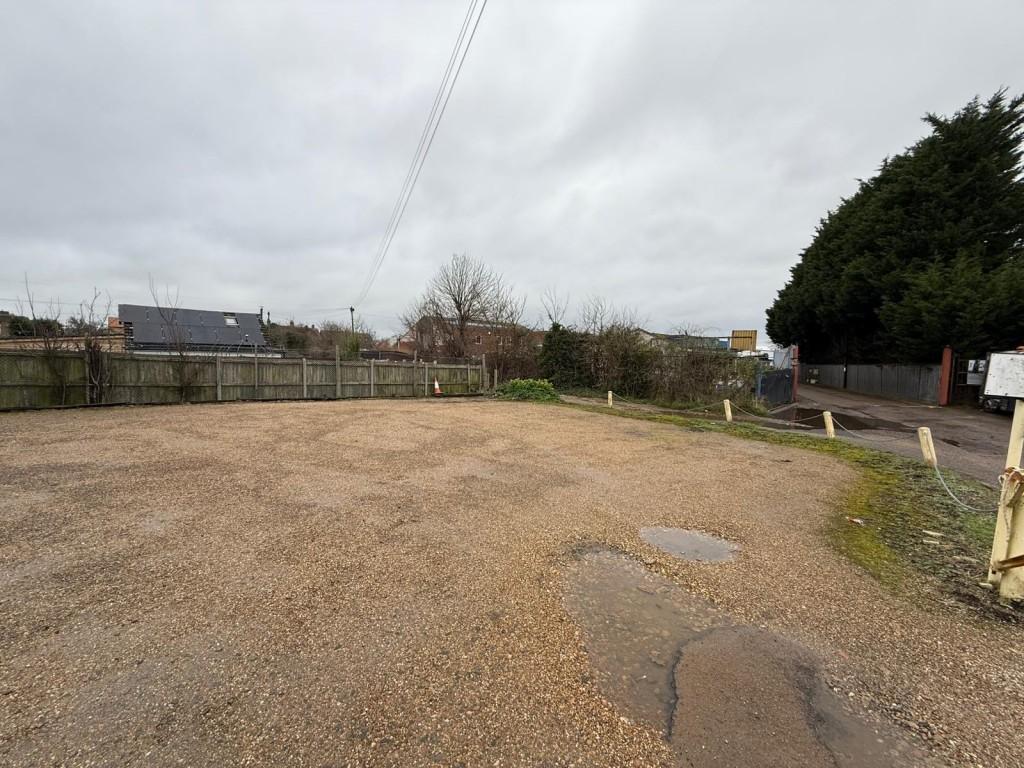Right side of land inside gate