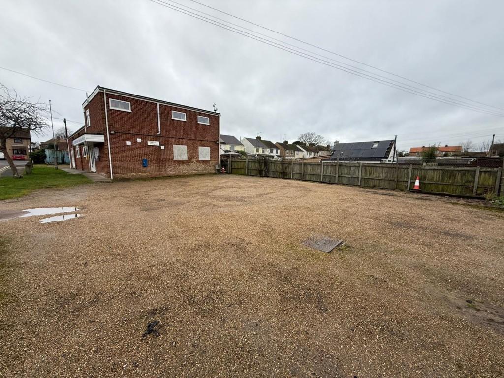 Right side of land showing building