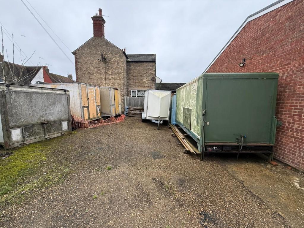 Left side of land showing containers