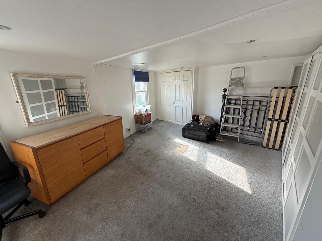 Main bedroom with built in wardrobe