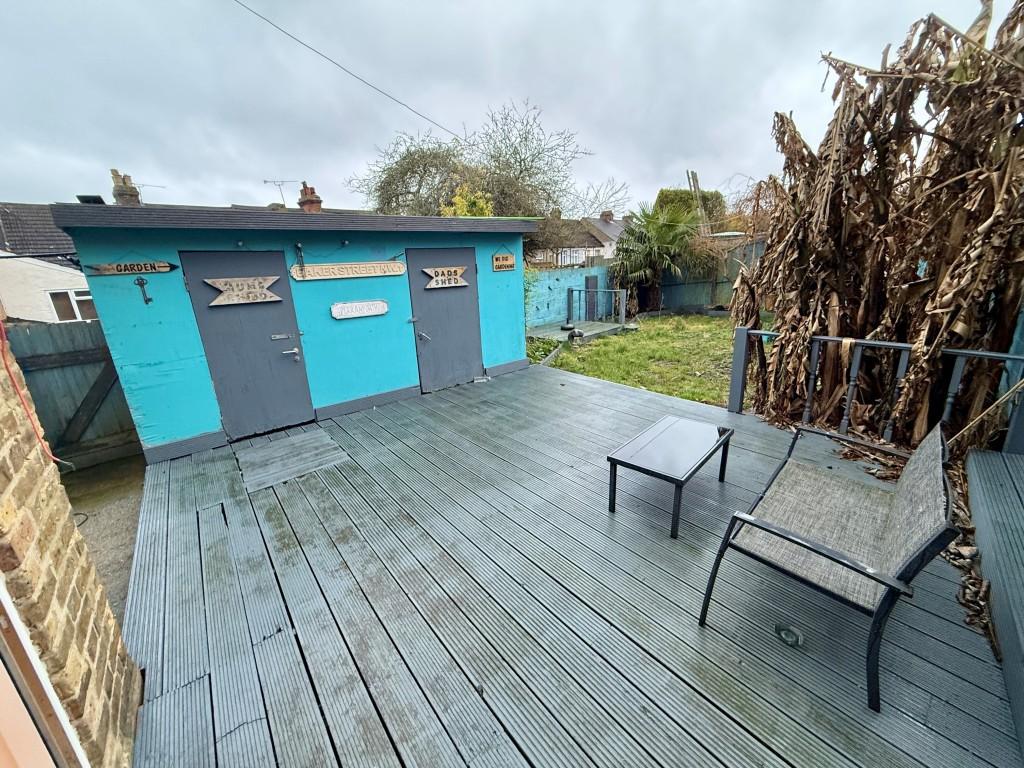 Decked area with outbuilding