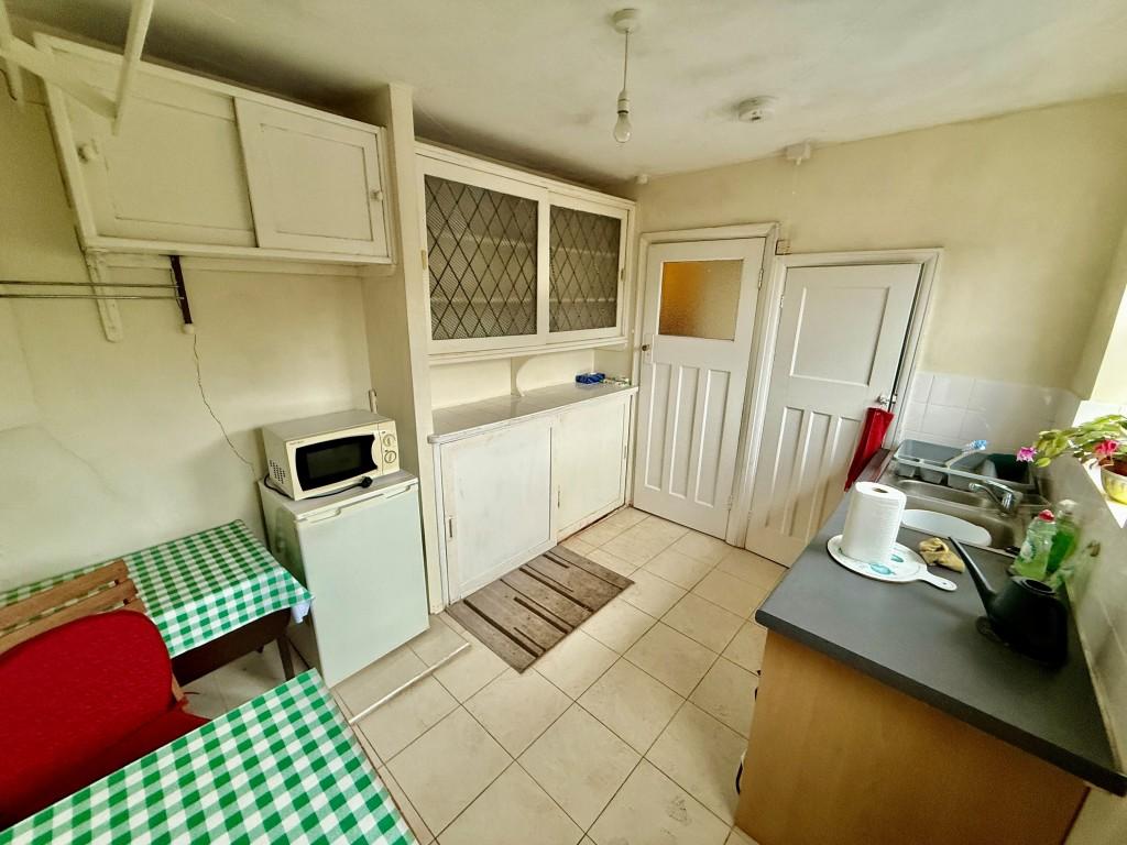 Kitchen with access to garden