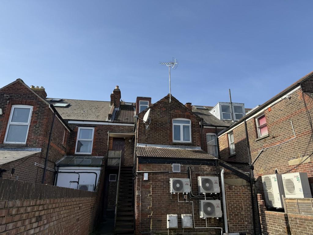 Rear of building showing stairs to flat entrance