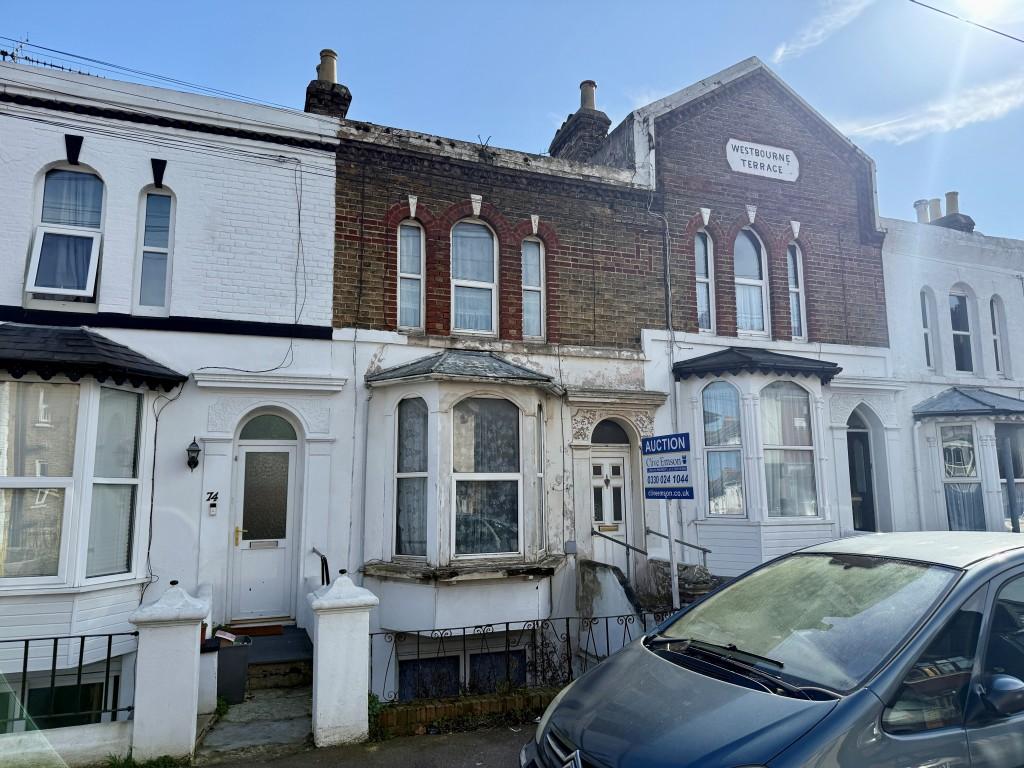 Mid-terrace three storey house
