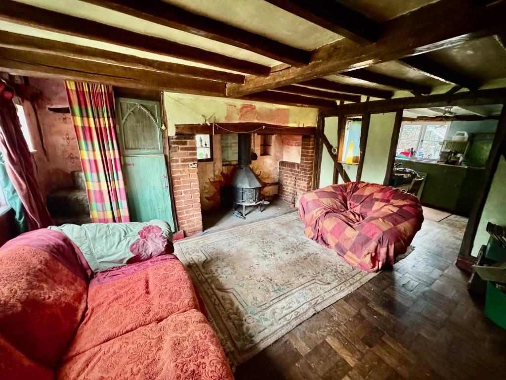 Living room with Inglenook fireplace