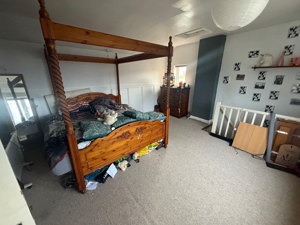Room on first floor currently used as a bedroom