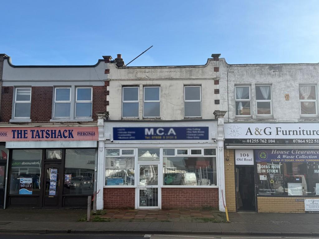 Front of building at 106 Old Road with shop and fl