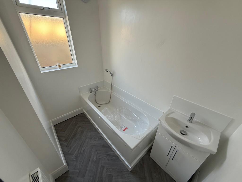 Newly fitted bathroom with vanity wash basin