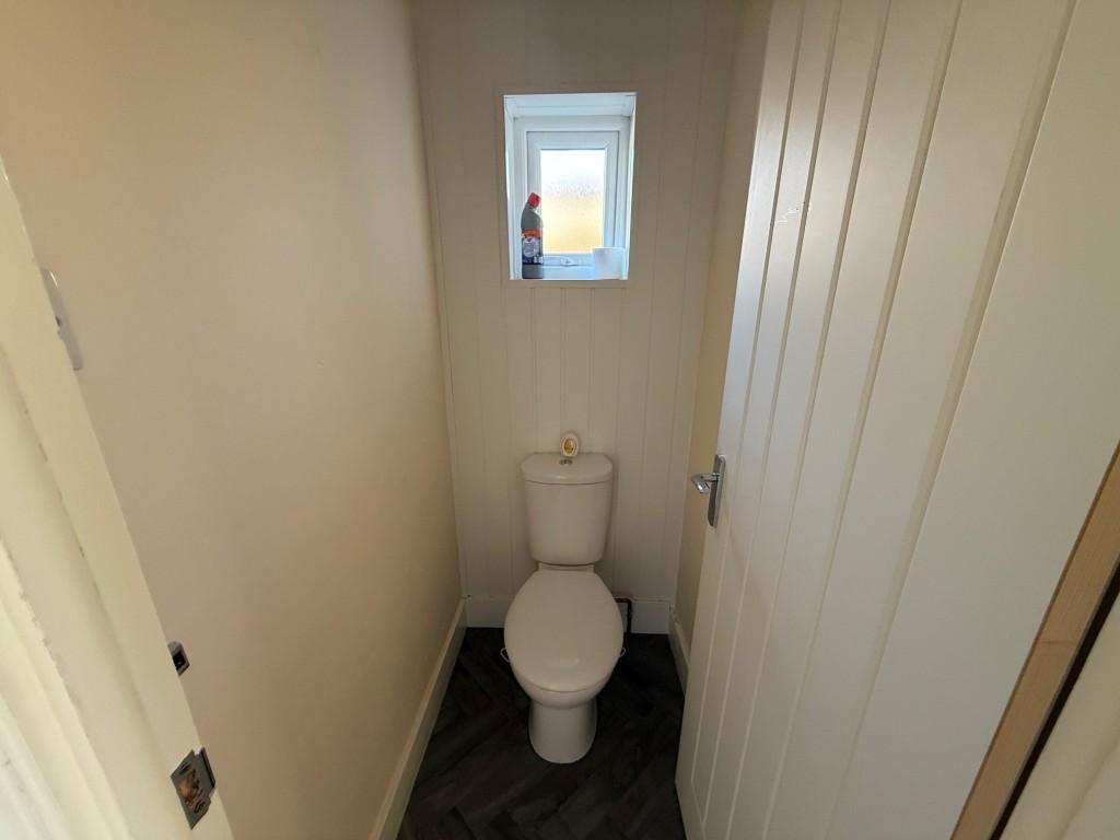 Separate WC with window to side