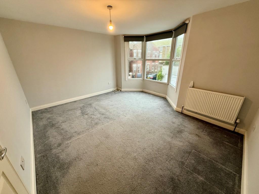 Bedroom one with bay window