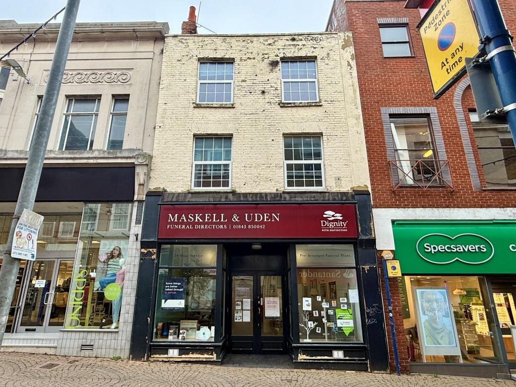 Mid-terrace town centre property
