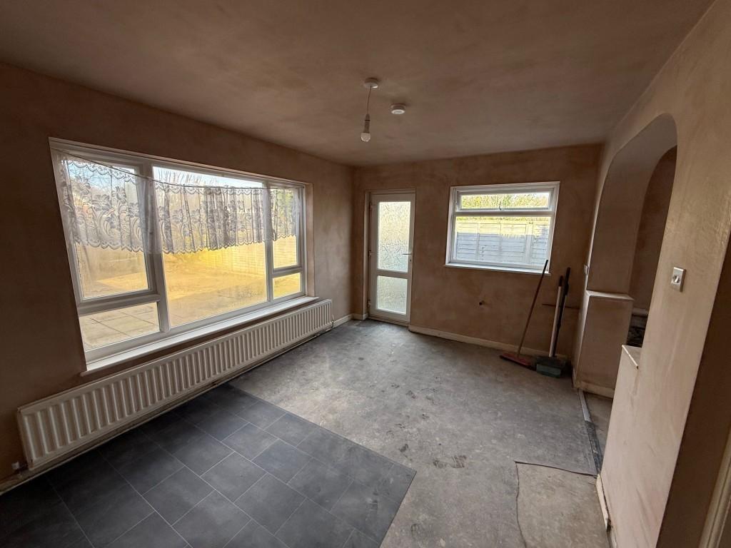 Rear family room with door to back garden