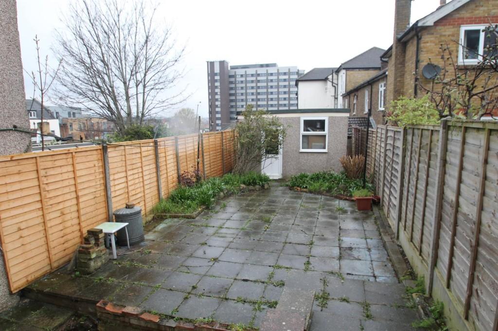 Paved garden area to rear of property
