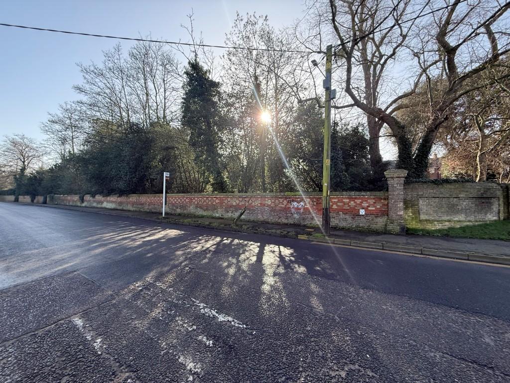Shot showing wall belonging to land and boundary