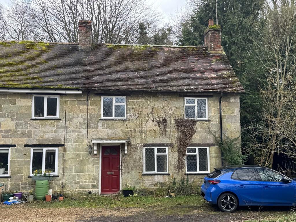 View of end-terrace cottage from road