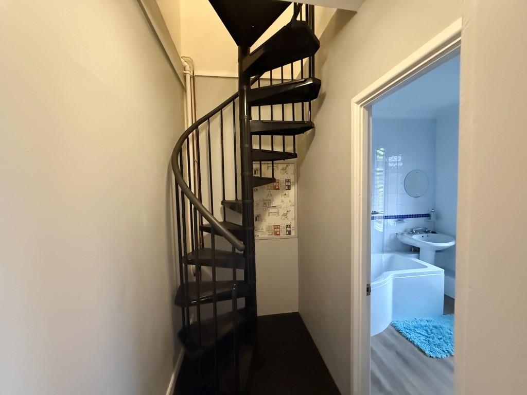 Spiral staircase to attic