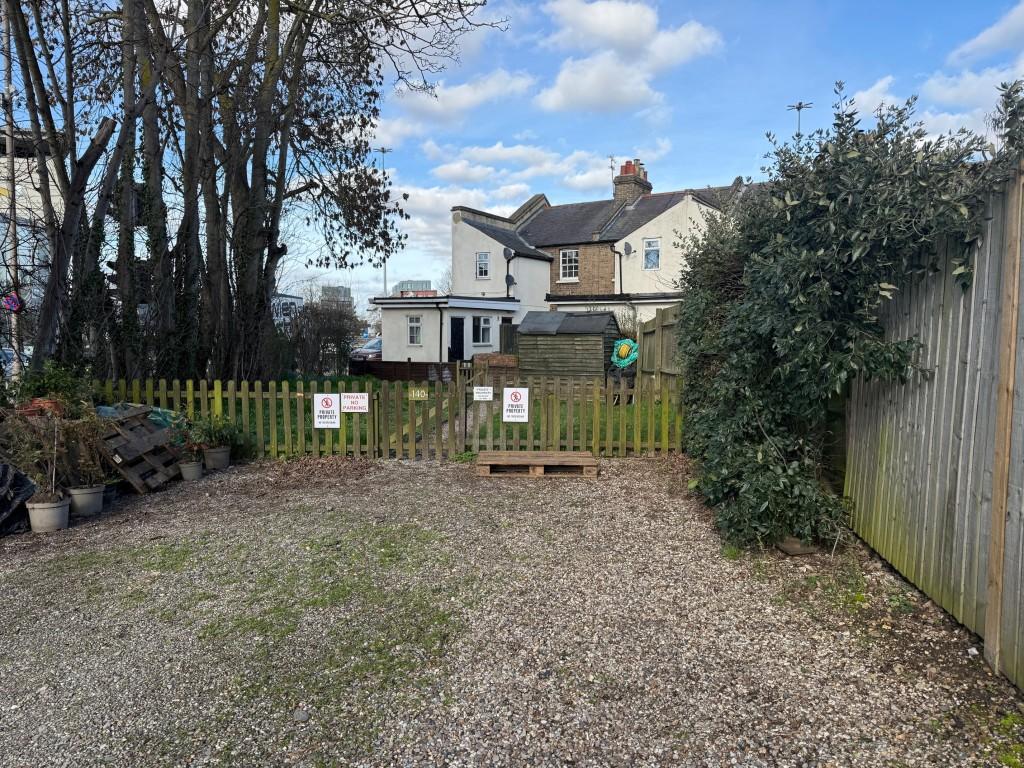 Parking area to the rear of the house