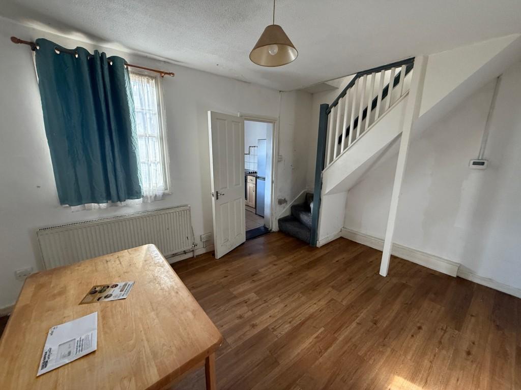 Dining Room with window to rear and stairs to firs