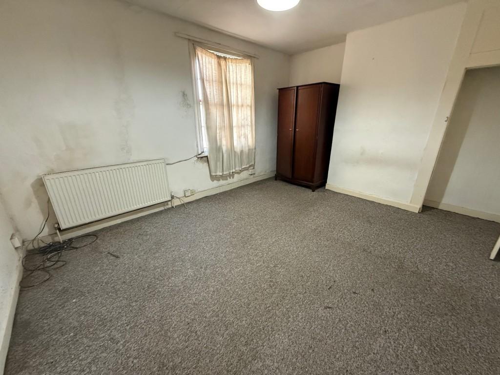 Bedroom one with window to front