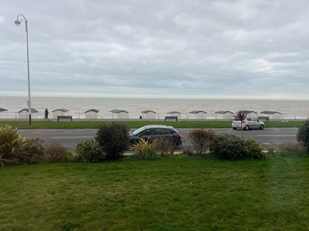 View of road and seafront from outside the front o