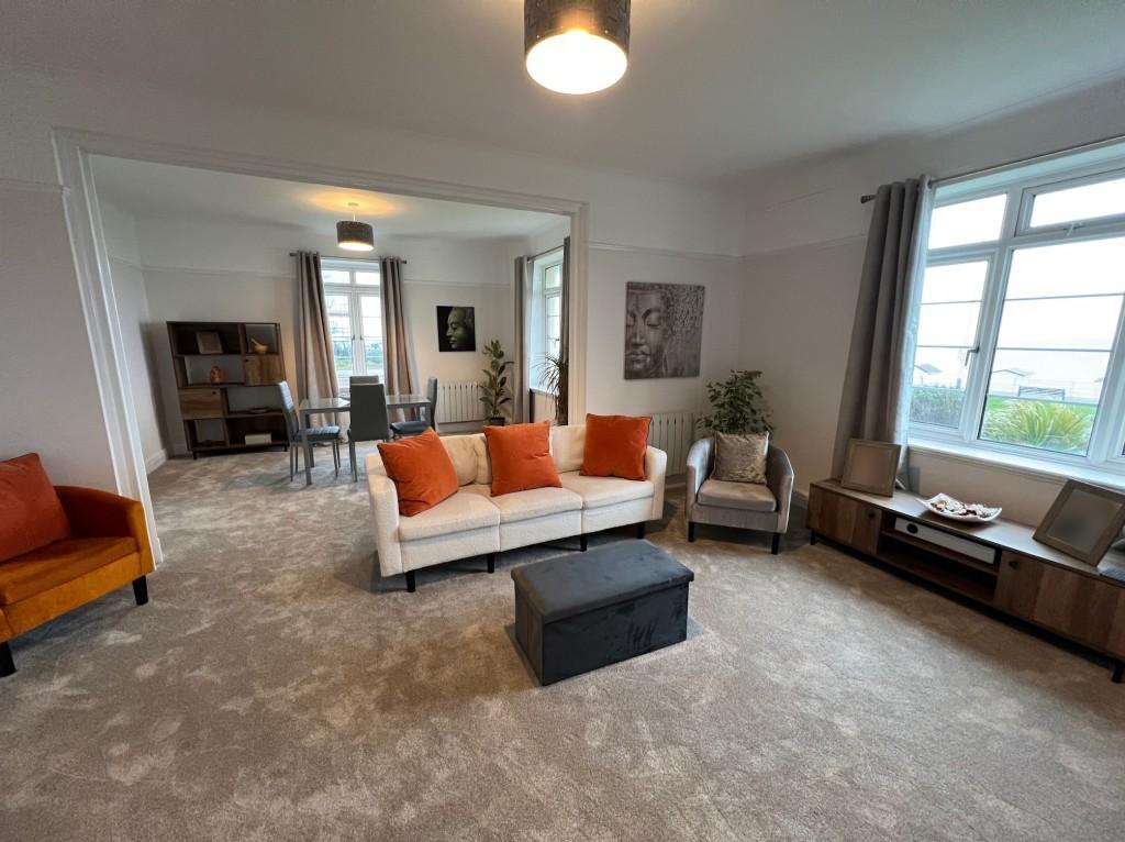 View of living and dining areas