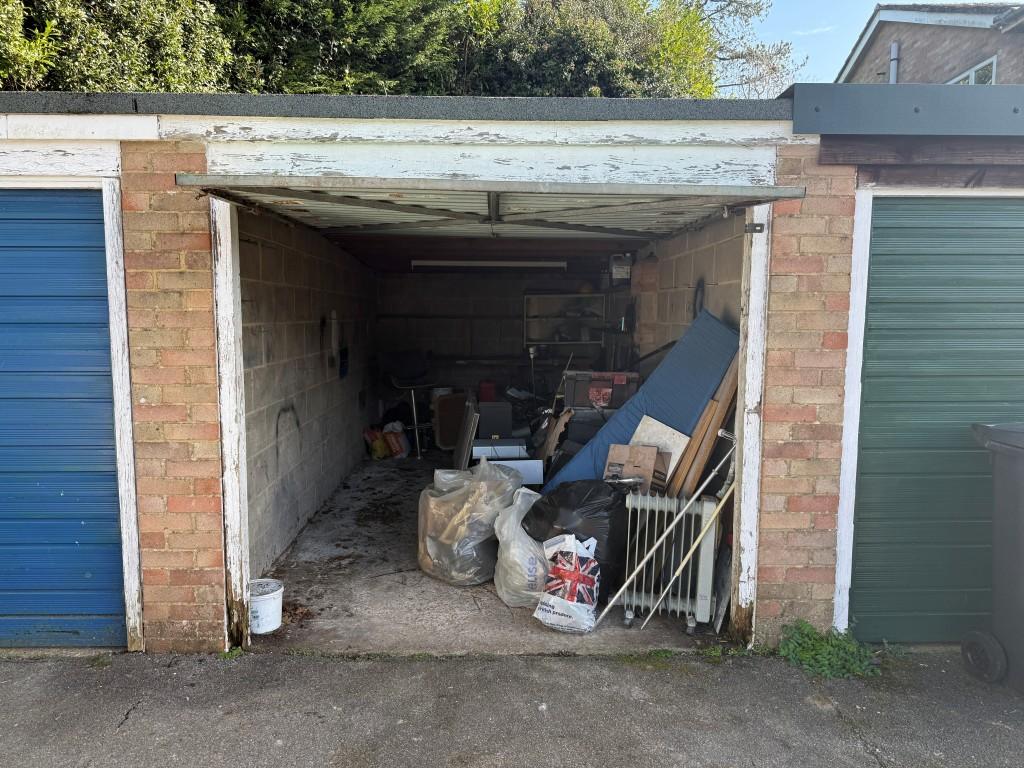 View of garage with open door