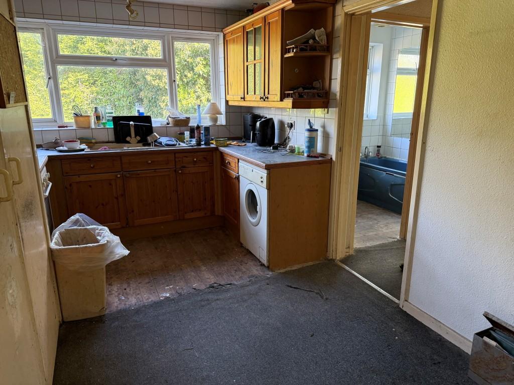 Kitchen with dining area and fitted units