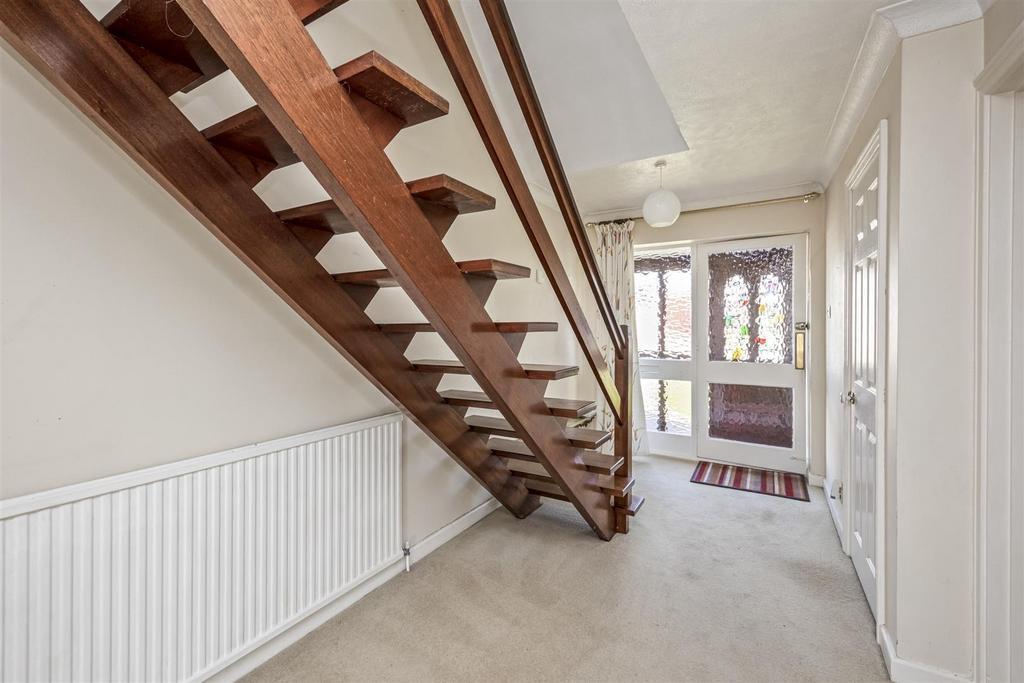 Stairs rising to First Floor