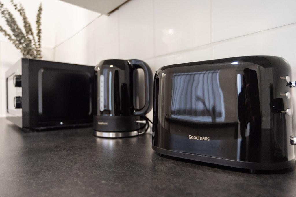 Well-presented kitchen countertop with matching...