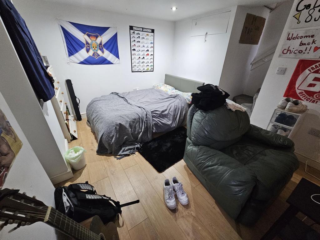 Cozy bedroom with double bed and chill seating...
