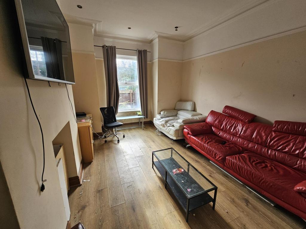 Bright living room with sofa and workspace...