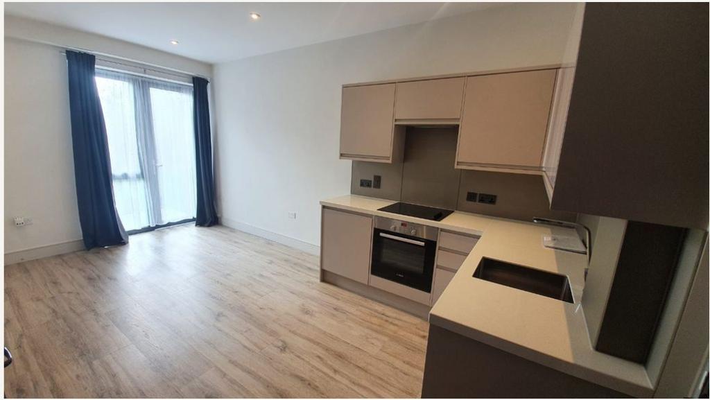 Living room with open-plan kitchen
