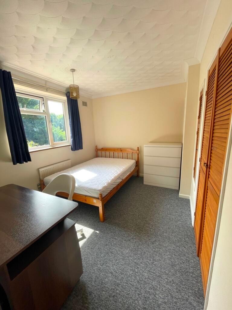 Bright, tidy single bedroom with a window letti...