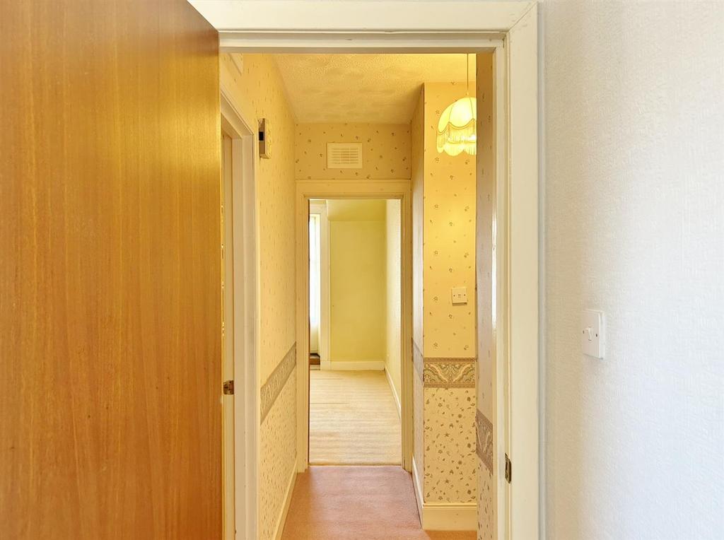 Hallway from bedroom one toward bedroom two