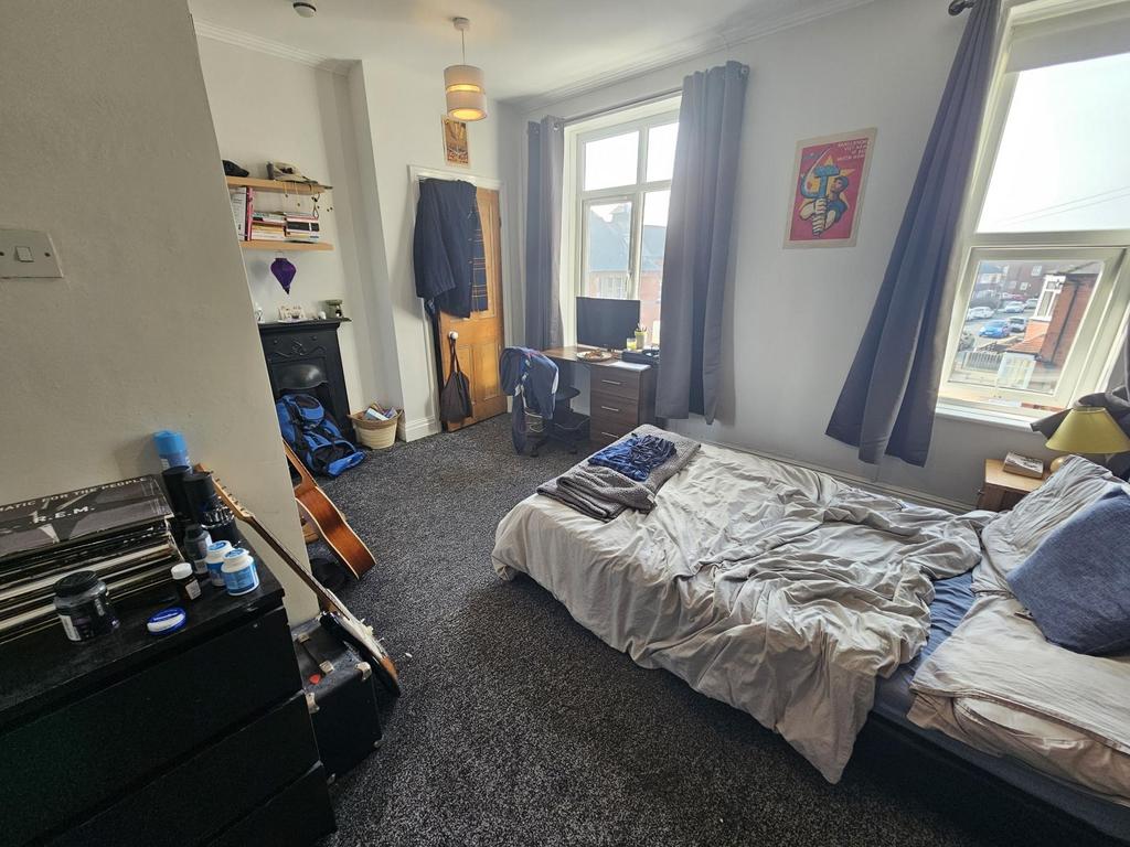Bright double bedroom with large windows...