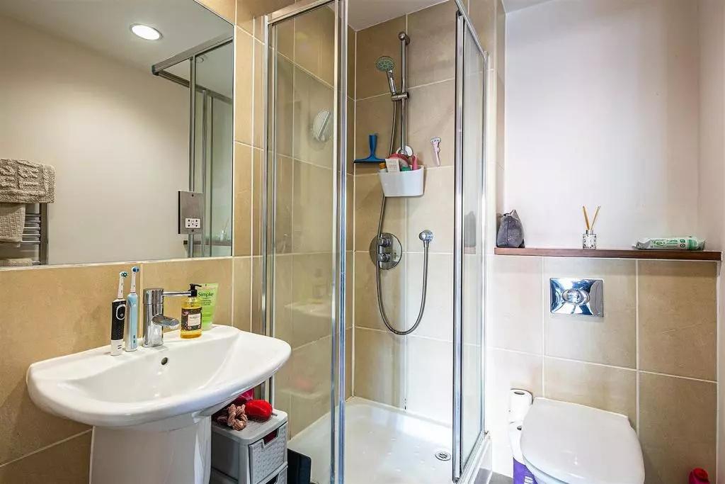 Bright and clean bathroom featuring a modern co...