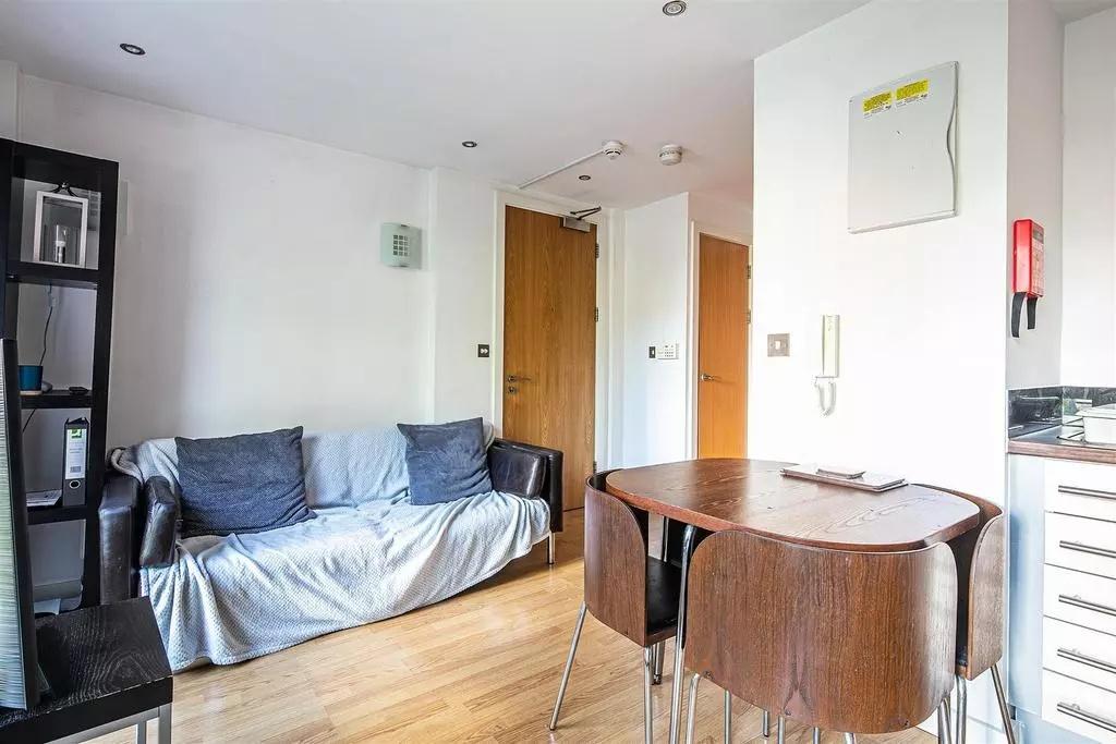 Bright and welcoming living area featuring a co...