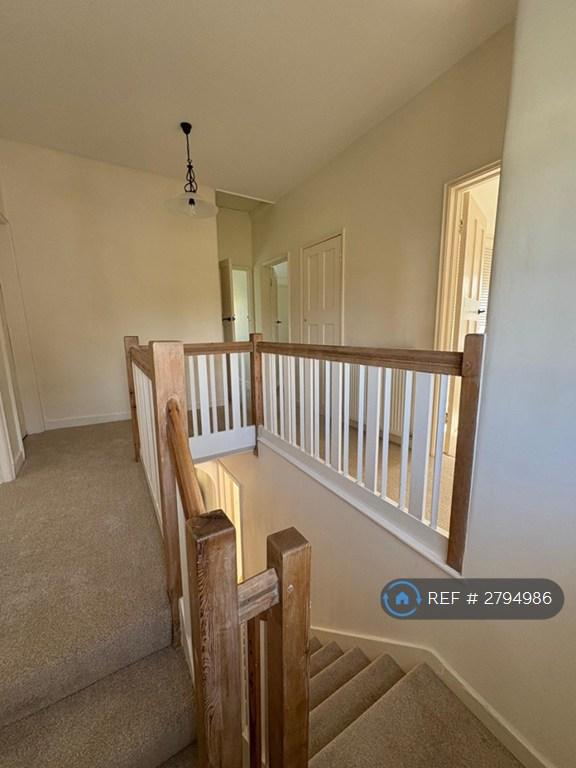 Upsatirs Landing With Wrap Around Staircase