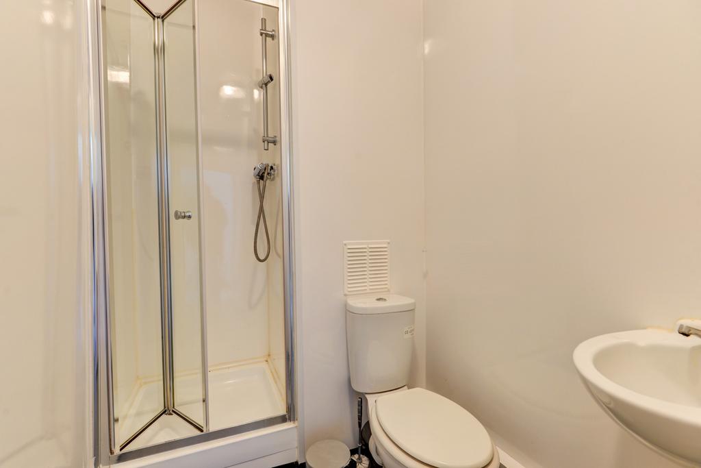 A clean and well-maintained bathroom with a spa...