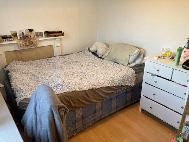 Bright, cosy bedroom with a large double bed, w...
