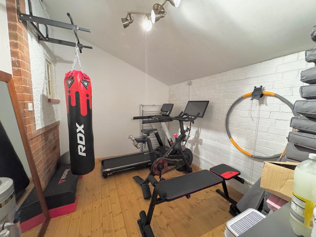 Gym integrated into garage space leaving...