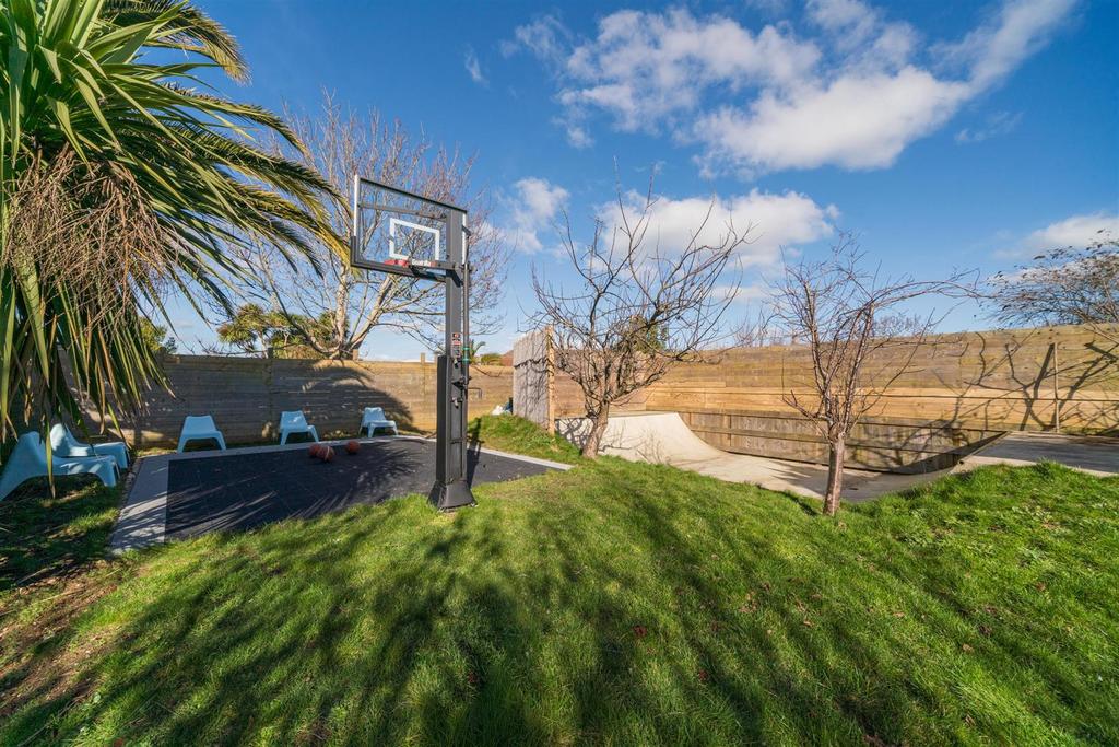 Basketball Court / Skate Ramp