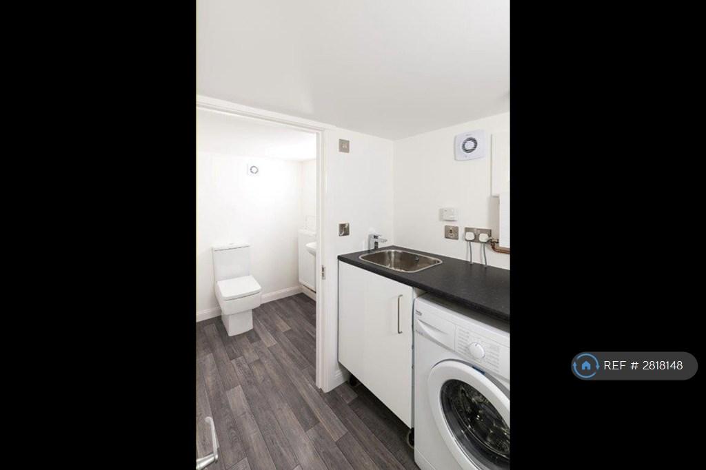 Laundry Room And Small Toilet