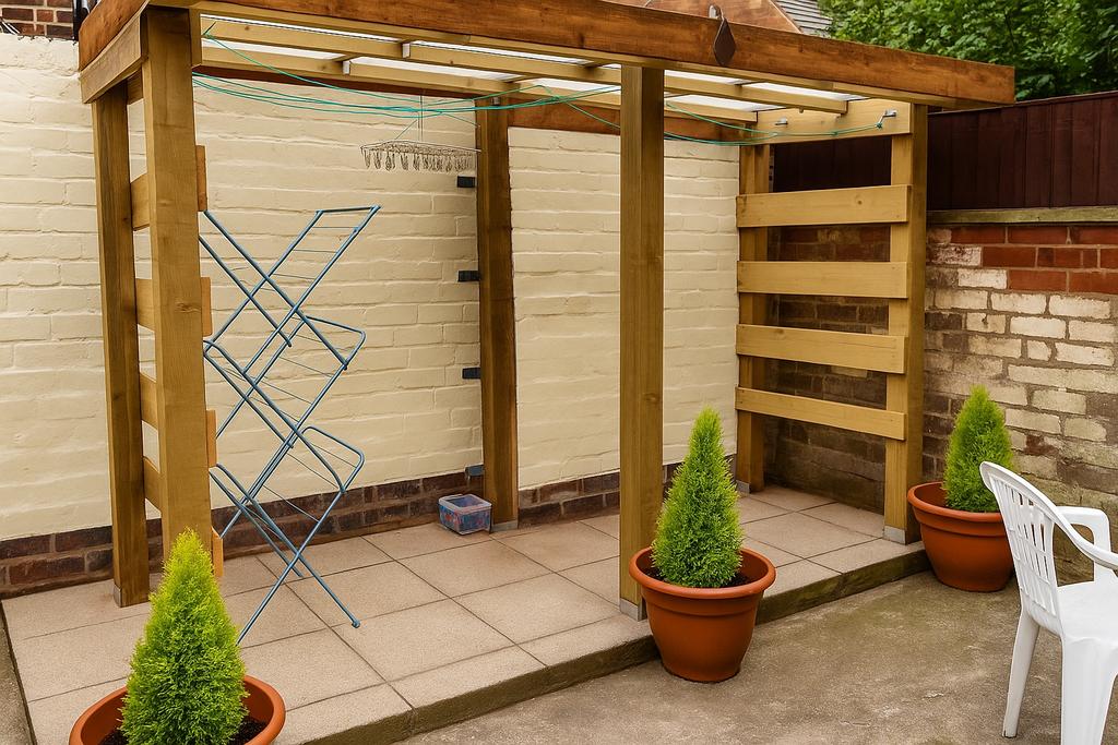 Well-maintained paved courtyard with a wooden p...